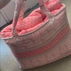 Pink quilted blanket with carrying tote
